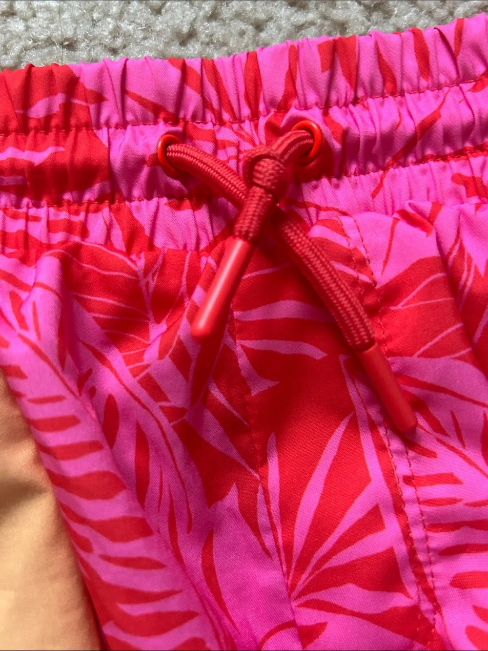 Pair of old navy active quick dry shorts-light orange and bright tropical pink